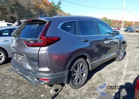 2021 Honda Cr-V Hybrid Touring z USA, uszkodzony, nr VIN 7FART6H95ME002620